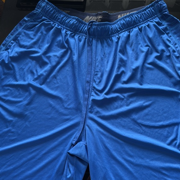 3 pairs of Nike shorts one purple one blue cut offe one flouresant yellow - Picture 3 of 9